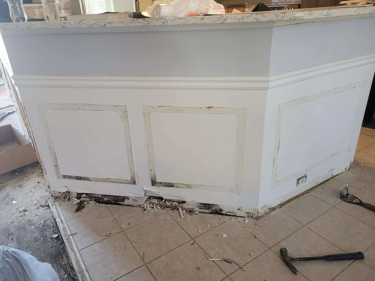 Water damage and mold on kitchen during Storm Damage Restoration in Denver